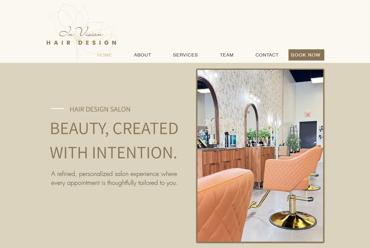 Screenshot of the In Vision Hair Design homepage, featuring its salon and Beauty, Created with Intention headline.